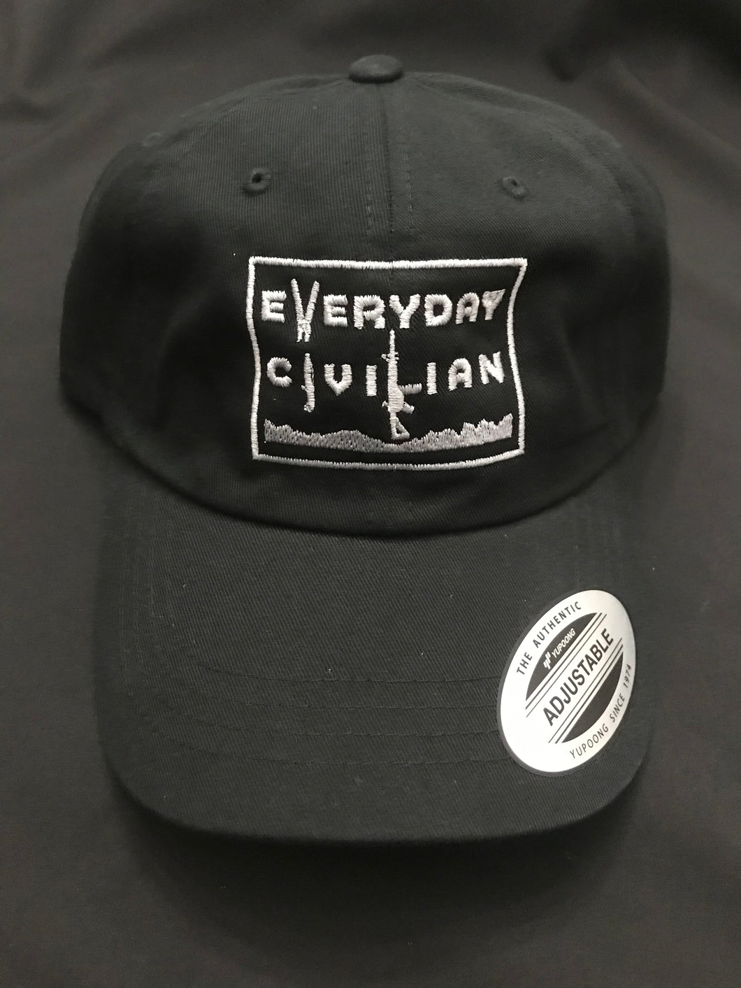 Black Yupoong adjustable, non-structured black hat with grey EveryDayCivilian Logo