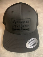 Grey "Trucker" style hat with black EveryDayCivilian Logo. Adjustable.